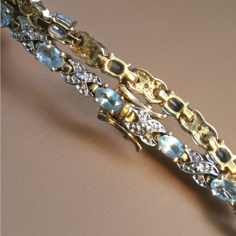 Elegant Gold and Silver Bracelet with Blue Accents